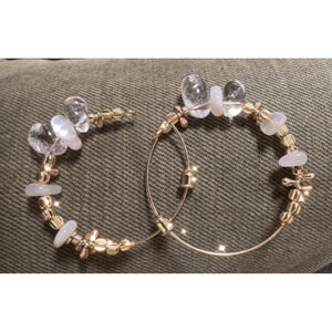 view showing the gold, clear and white beads/stones that go around the hoop