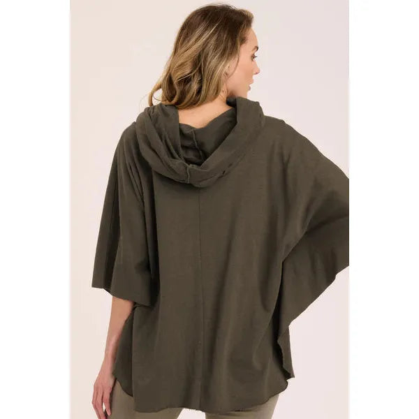 Paige Poncho back view showing that the cowl neck can be used as a hood