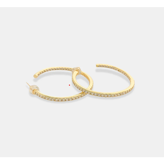 Gold hoop post earrings with cz accent flat lay view
