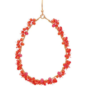 full view showing the teardrop shape of the earrings with the bright, coral colored flower detailing
