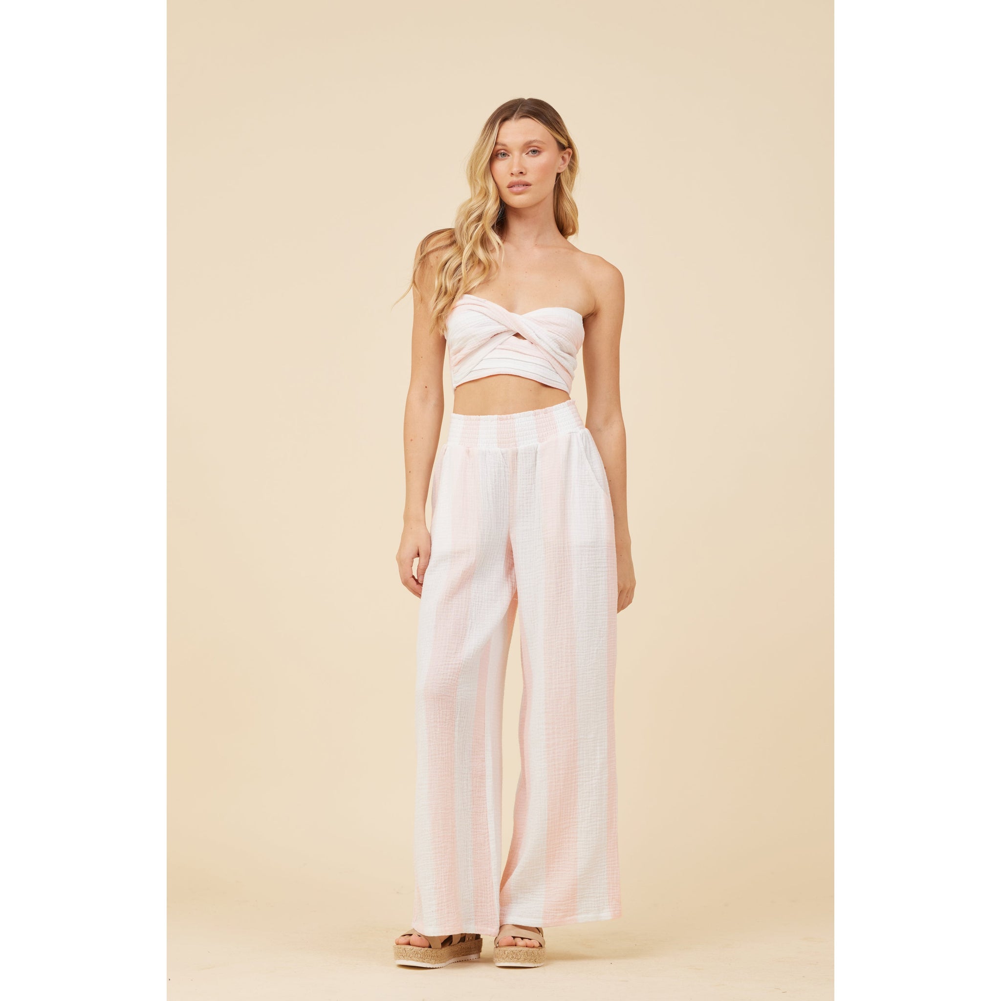 pink and white cabana stripe bandeau top paired with pants