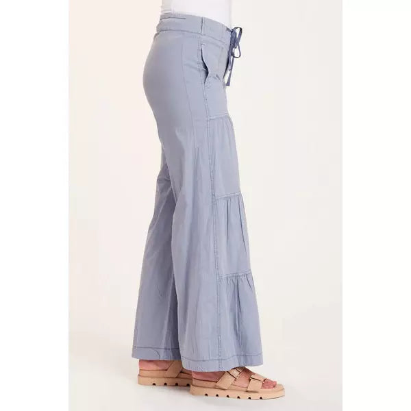 side view of terraced flare pant in light blue